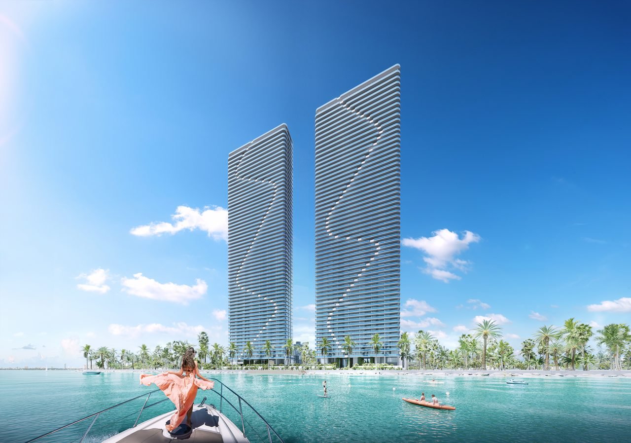 Aria Reserve Miami — twin towers seen from Biscayne Bay with boaters in the foreground (artist's rendering)