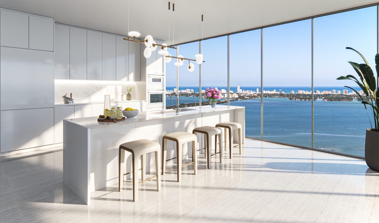 Aria Reserve Miami residence — open kitchen with island seating and water views (artist's rendering)