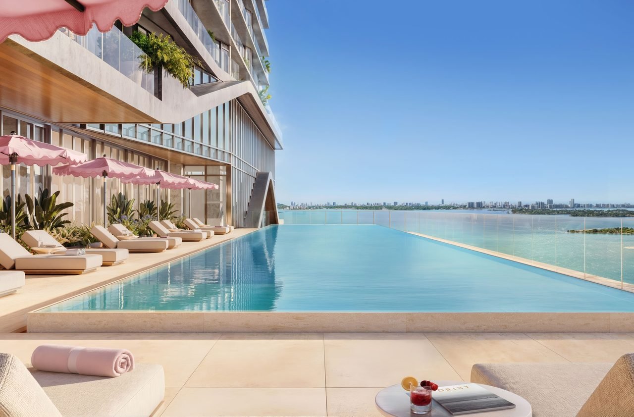 The Cove Residences — waterfront infinity pool overlooking Biscayne Bay (artist's rendering)