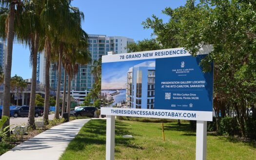 New waterfront condo development announcement sign