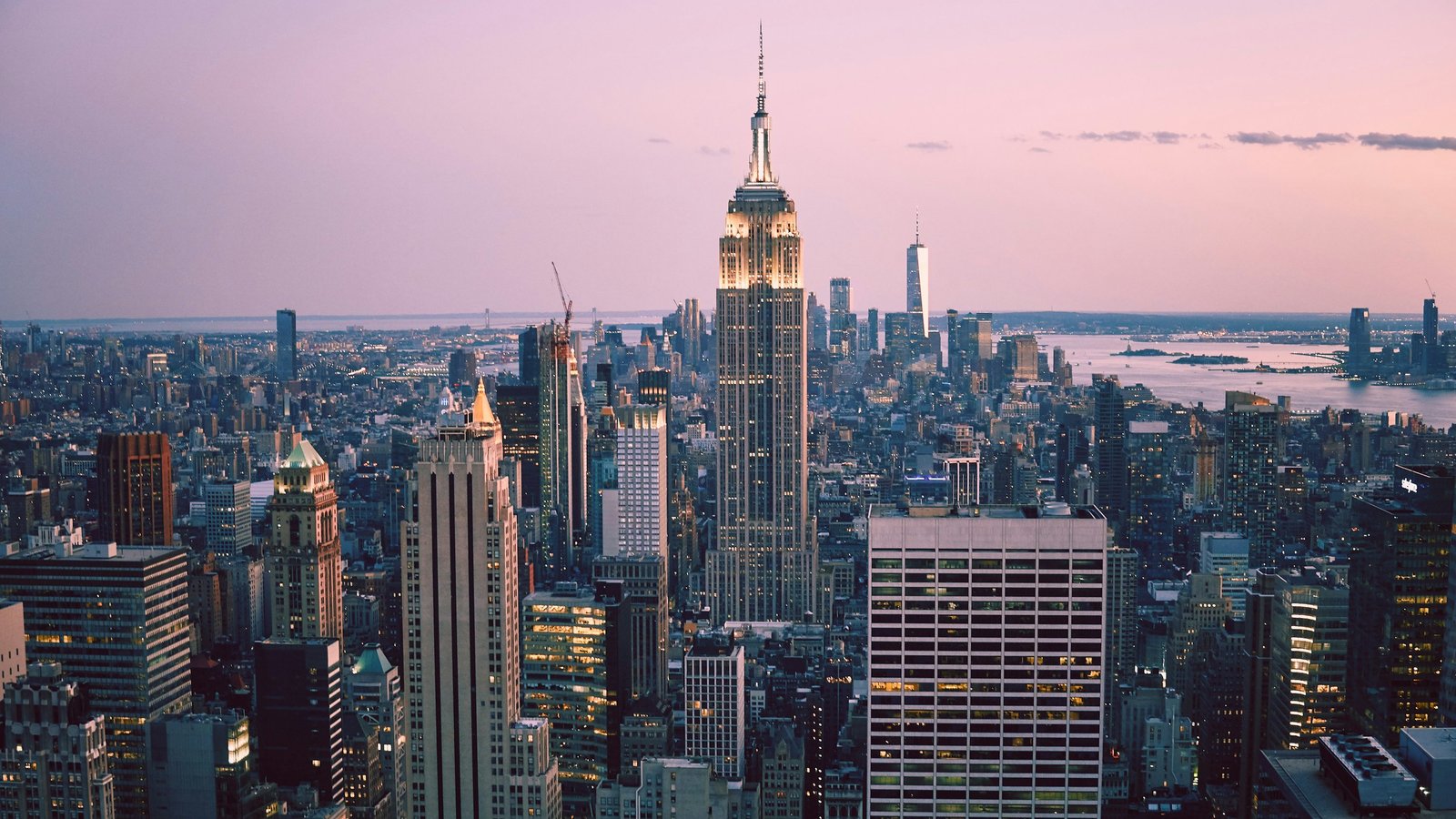 Midtown Manhattan skyline featuring Empire State Building at sunset