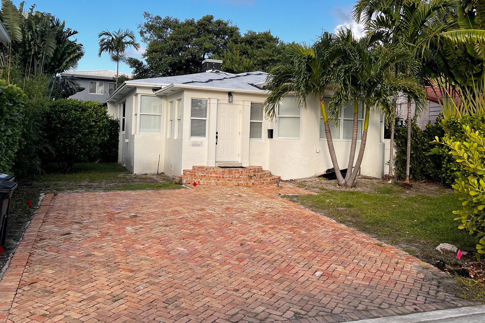 Aerial view of a large, integrated family compound estate