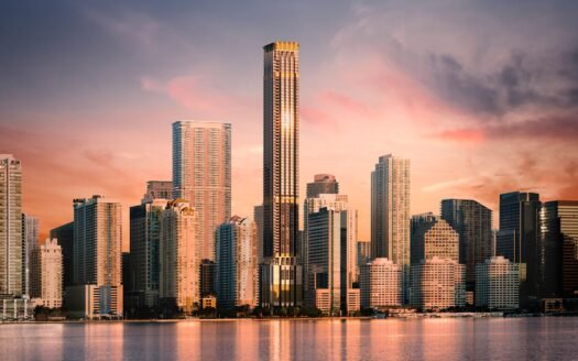 Rent vs Buy in Miami Sunset view of Miami skyline with modern skyscrapers reflecting in the water, South Florida, USA.